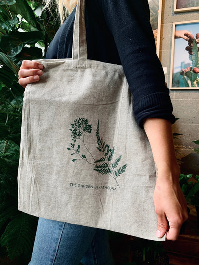 The Garden Strathcona branded grey tote bag made from 100% organic recycled materials